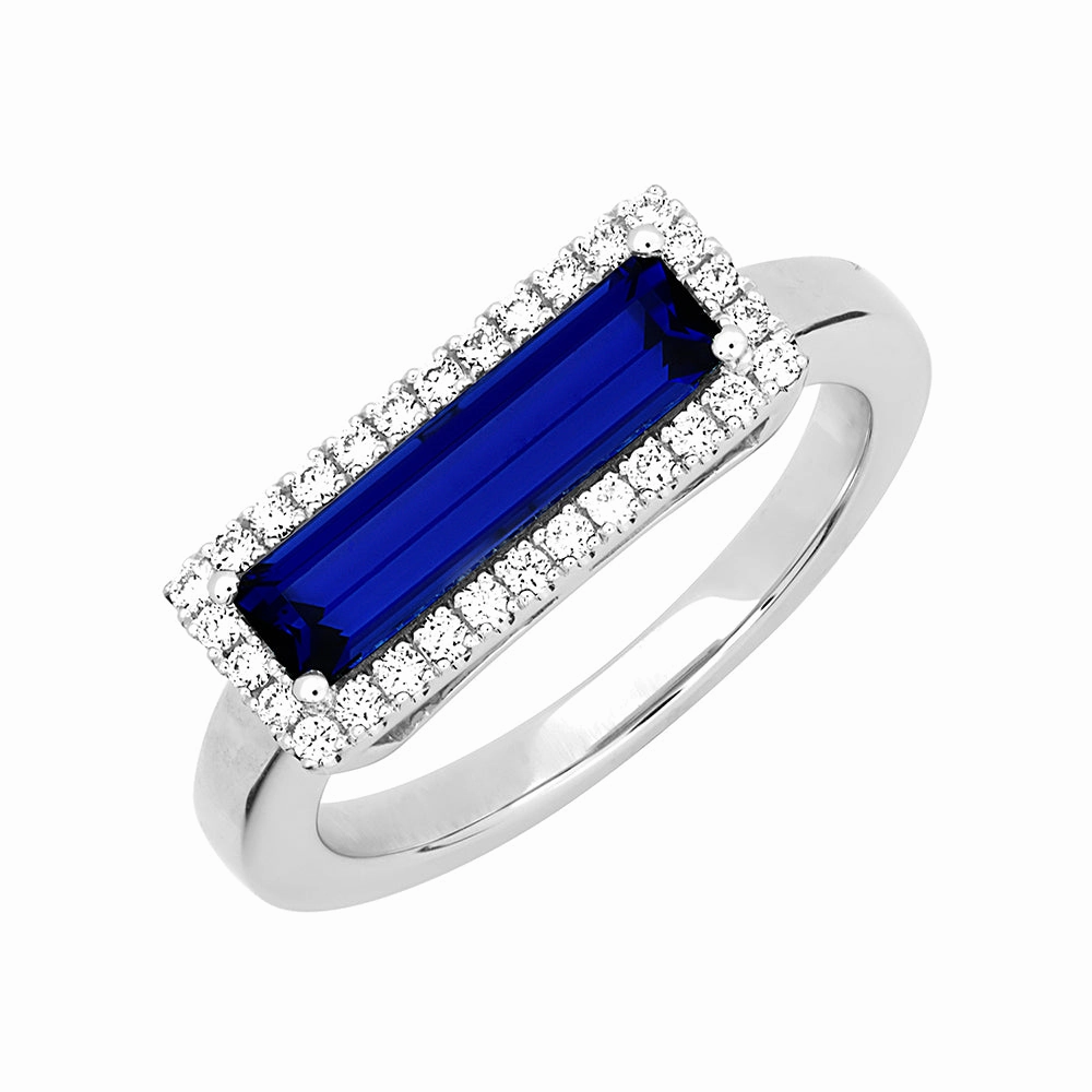Vivid Finish Stylish Design 14K white gold ring featuring an elongated baguette Chatham lab grown sapphire with Chatham lab grown diamond halo accents.