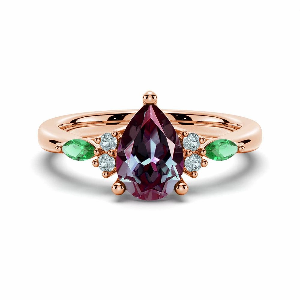 Sparkle Surface Showstopper Look 1.5 CT. Pear Shaped Alexandrite Engagement Ring With Emerald Accents