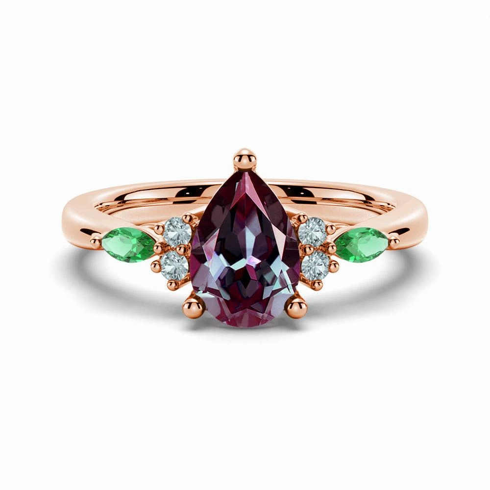 Shiny Jewels Artisan Finish 1.5 CT. Pear Shaped Alexandrite Engagement Ring With Emerald Accents