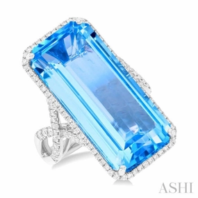 Bold Style 26x12 MM Emerald Cut Blue Topaz and 1/2 Ctw Round Cut Diamond Halo Semi-Precious Ring in 14K White Gold