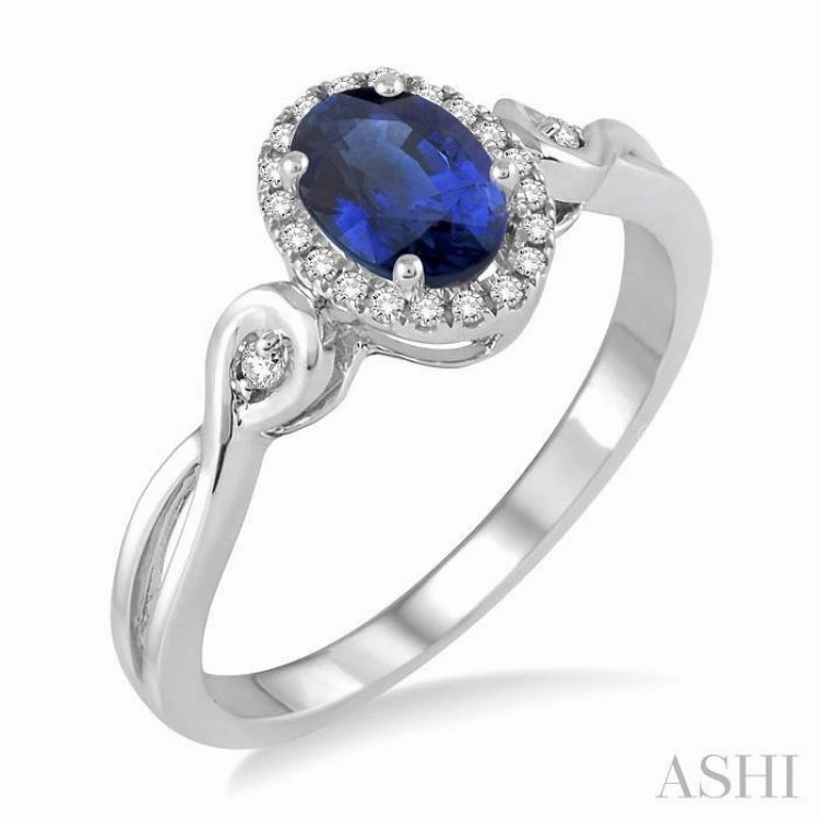 Brilliant Piece Exploratory Piece 6x4 MM Oval Cut Sapphire and 1/10 Ctw Round Cut Diamond Ring in 10K White Gold