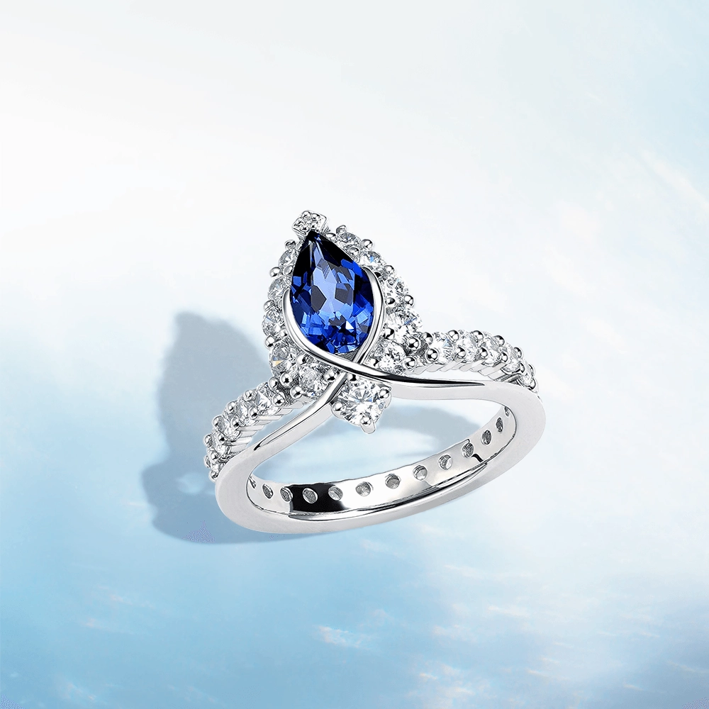 "ENDLESS BLUE" Luxe Crown Pear Shaped Sapphire Ring Weekend Glam Model Fit