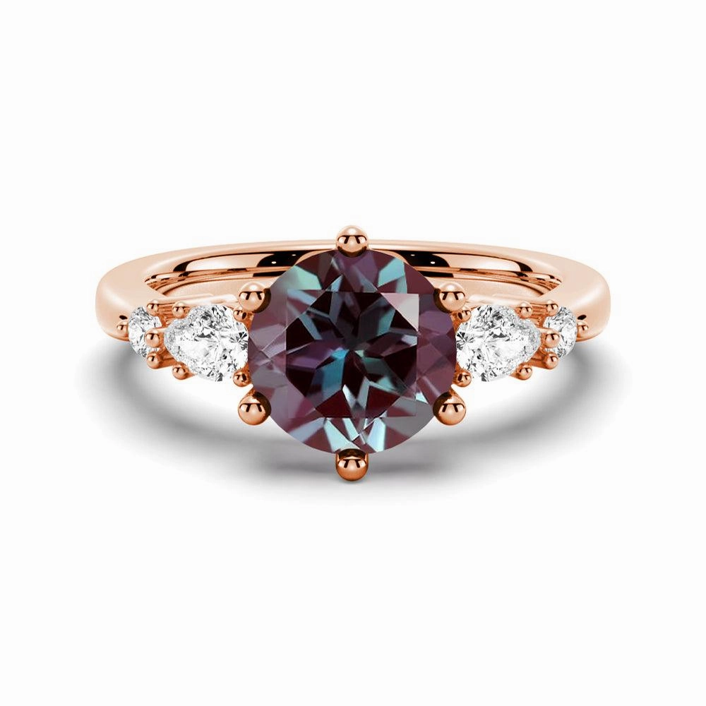 Glamourous Piece Weekend Glow 2 CT. Round Cut Alexandrite Engagement Ring With Pear Shaped Moissanite Accents