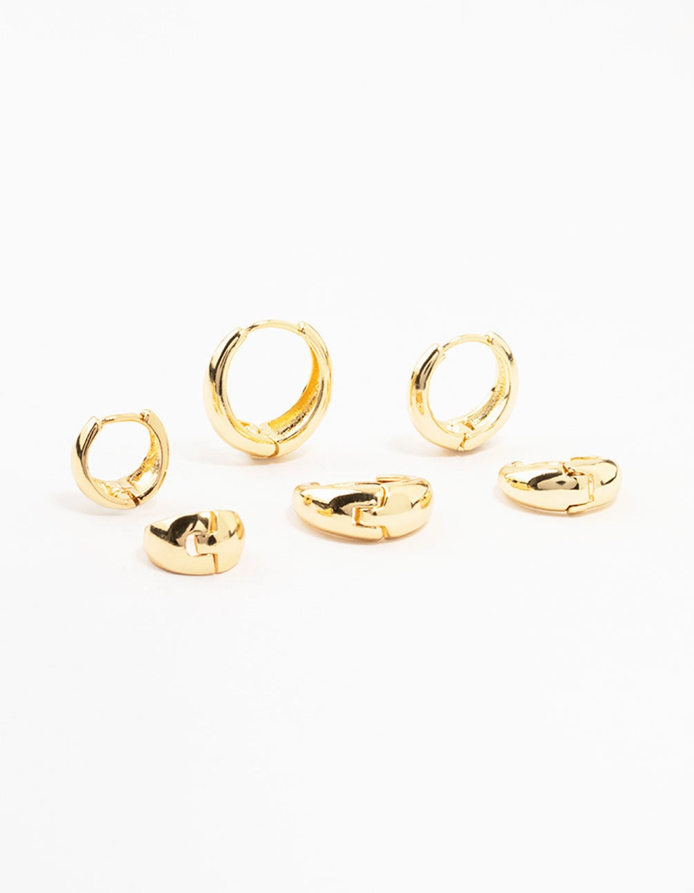 Classic Gold Plated Brass Chunky Hoop Earrings 3-Pack Glamorous Appeal Flat Lay