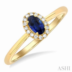 Bold Trinket 5x3 MM Oval Shape Sapphire and 1/20 Ctw Single Cut Diamond Halo Precious Ring in 10K Yellow Gold