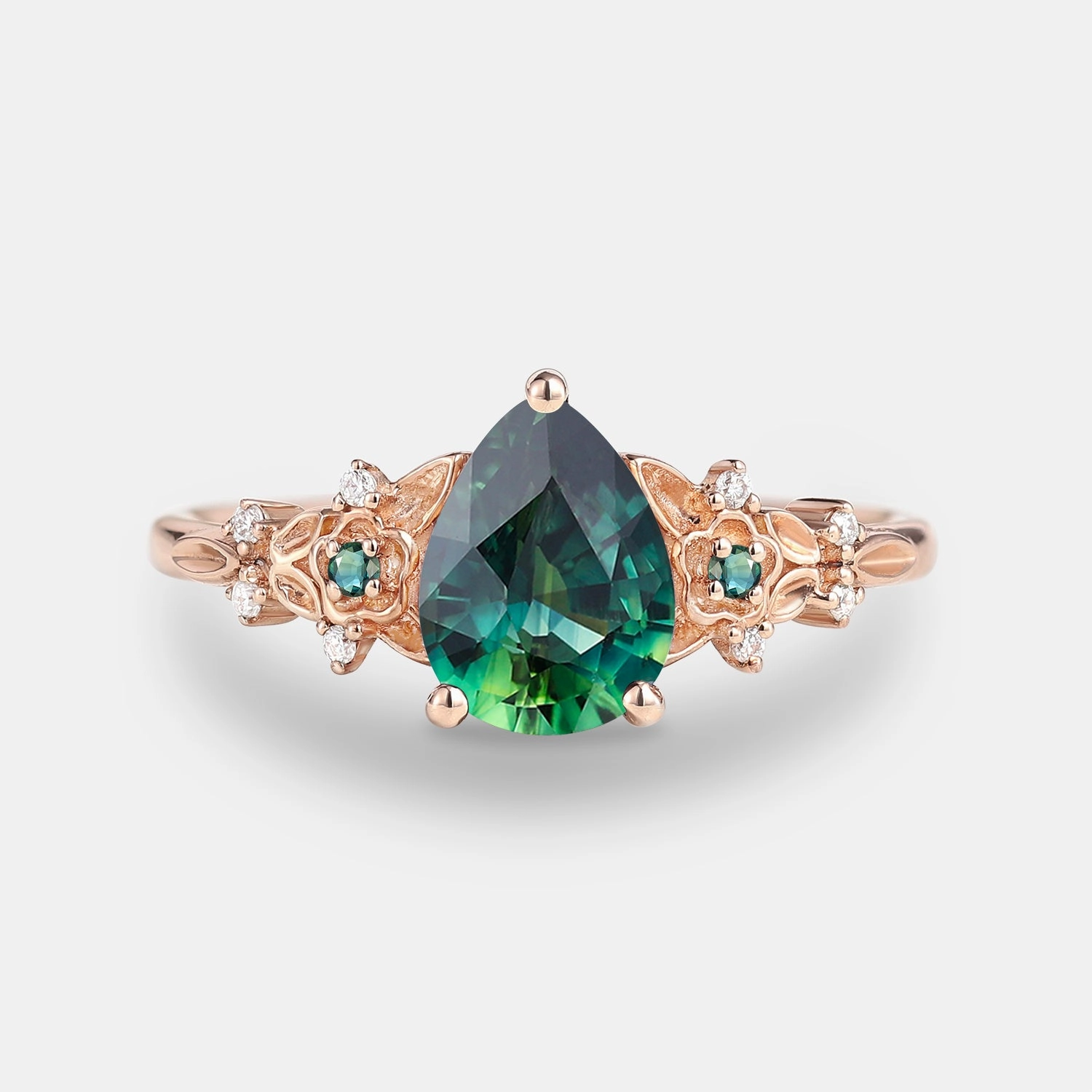 Natural Shine Feminine Touch Black Gold Pear Shaped Teal Sapphire Flower Engagement Ring