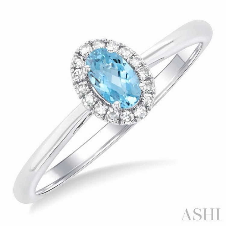 Subtle Shine Low Profile Look 5x3 MM Oval Shape Aquamarine and 1/20 Ctw Single Cut Diamond Halo Semi-Precious Ring in 14K White Gold