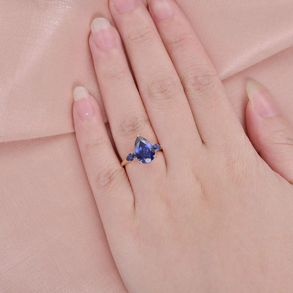 Soft color Rich Shine 3.5ct Pear Shaped Sapphire Classic Three-stone Ring