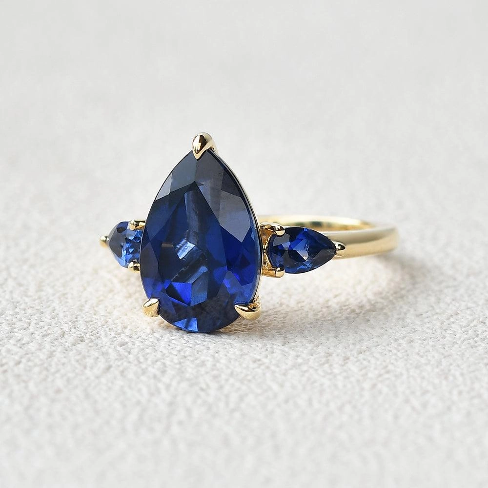 Refined Sparkle 3.5ct Pear Shaped Sapphire Classic Three-stone Ring