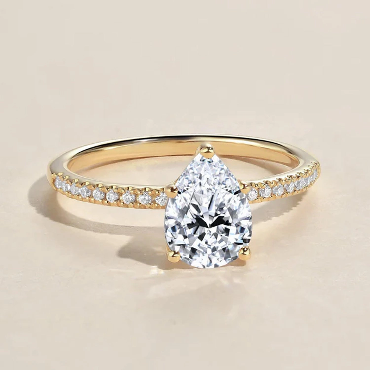 Classic Form Office Ready 1.5ct Pear Shaped Moissanite Pave Classic Solitaire Ring