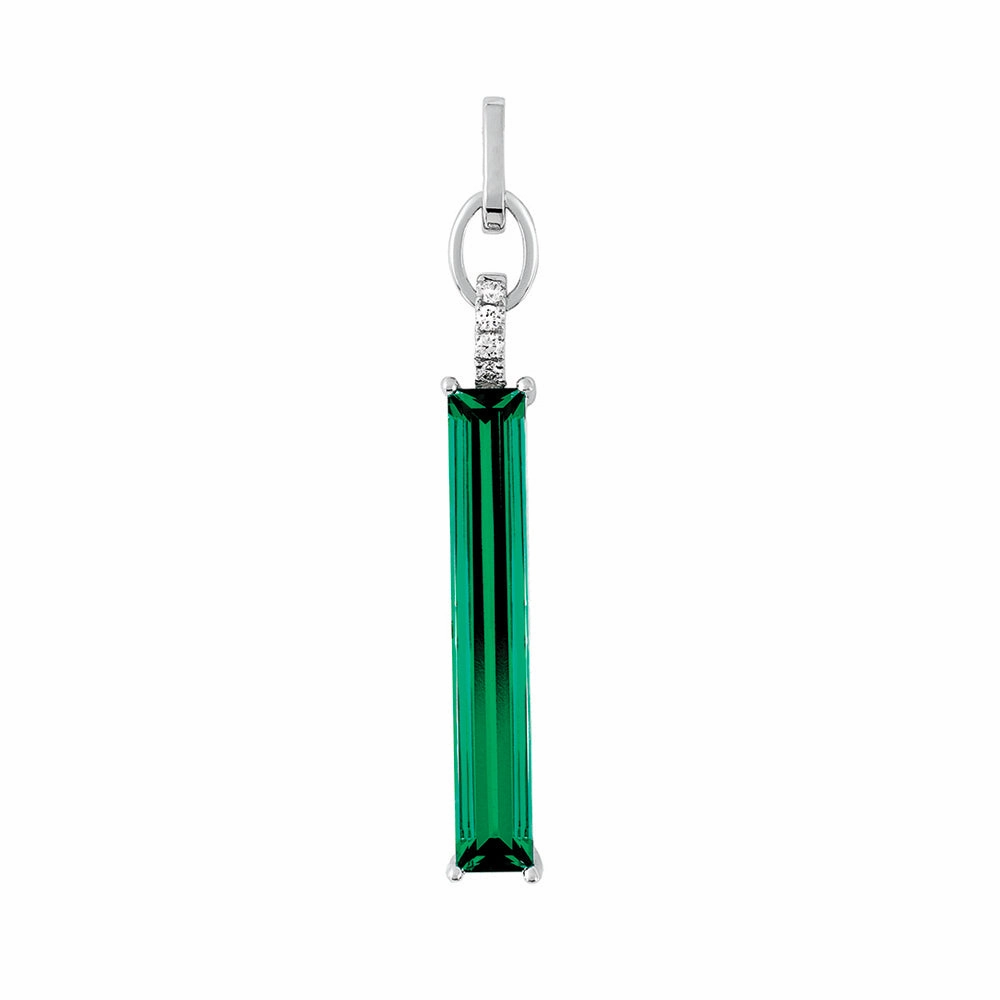 This 14K white gold pendant features an elongated baguette Chatham lab grown emerald with Chatham lab grown diamond accents. Glistening Shine