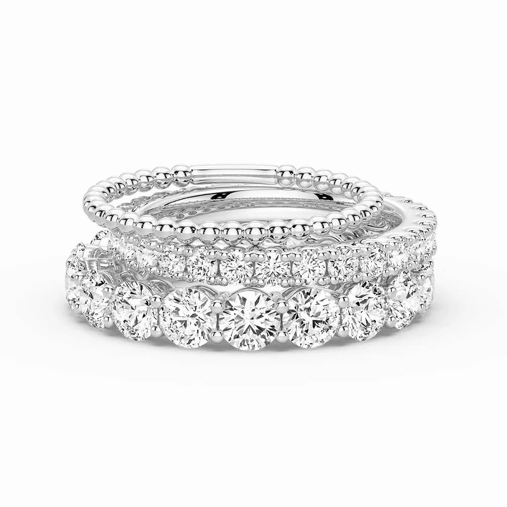Lustrous Form Sophisticated Spark French Pave Round Cut Moissanite Eternity Bands with Simple Beaded Band Stacking Rings