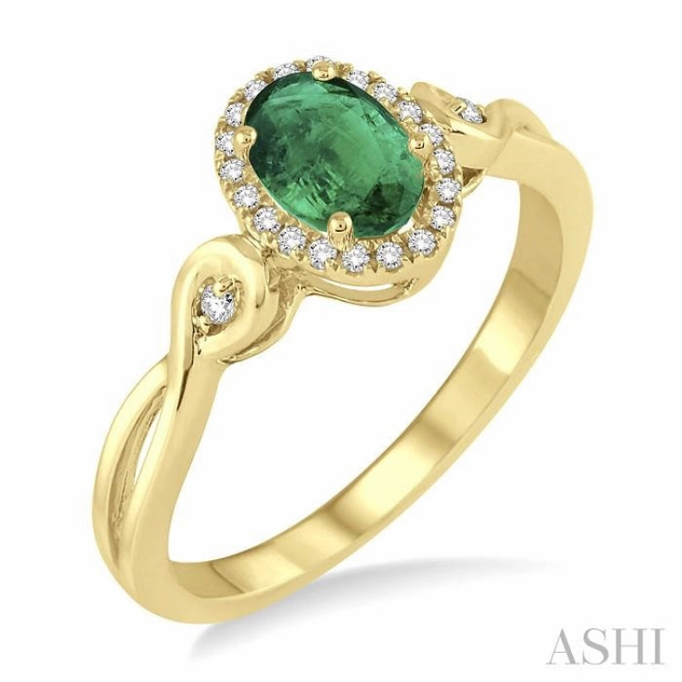 Brilliant Style Statement Spark 6x4 MM Oval Cut Emerald and 1/10 Ctw Round Cut Diamond Ring in 10K Yellow Gold
