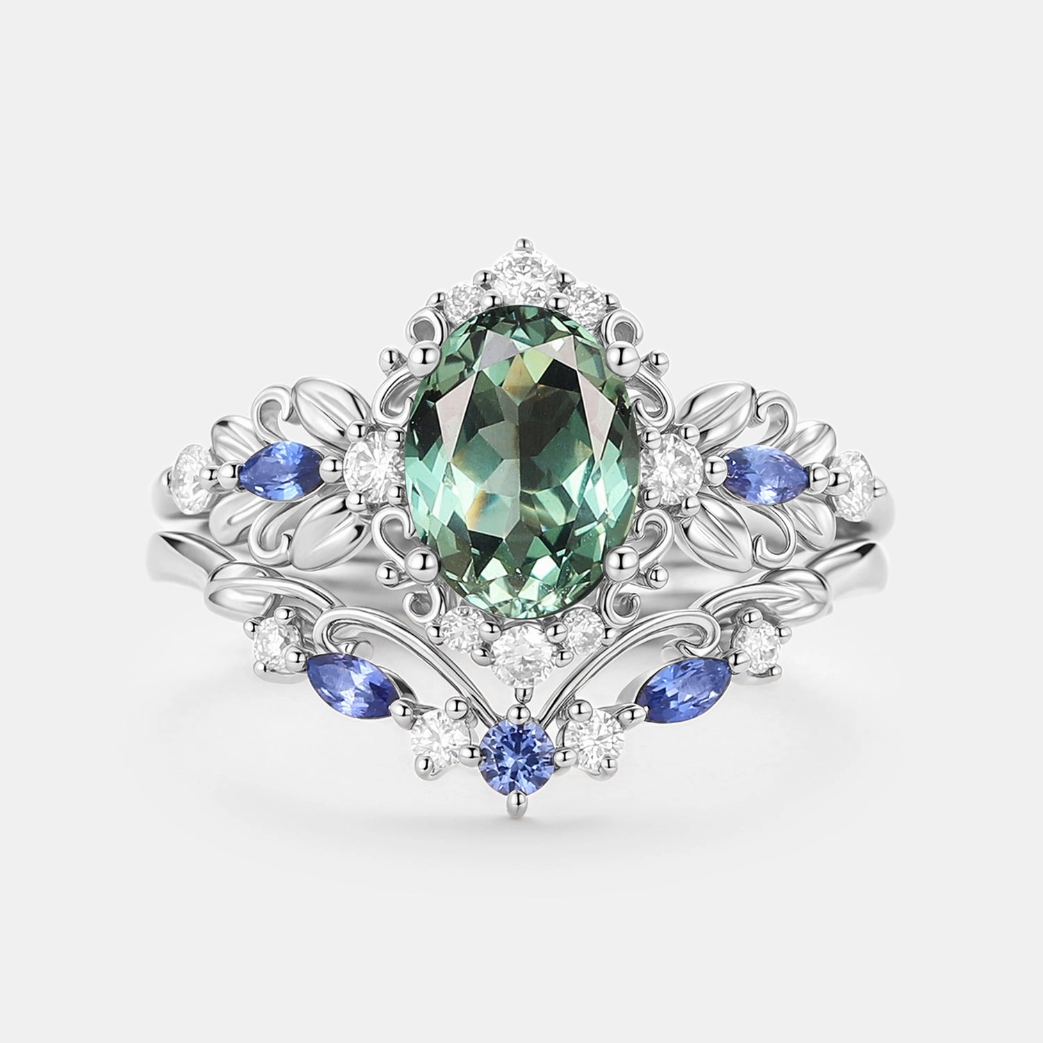 Elegant Touch Pieces Luxury Flow Oval Cut Leafy Lab Green Sapphire Engagement Ring Set 2pcs - Viriditas
