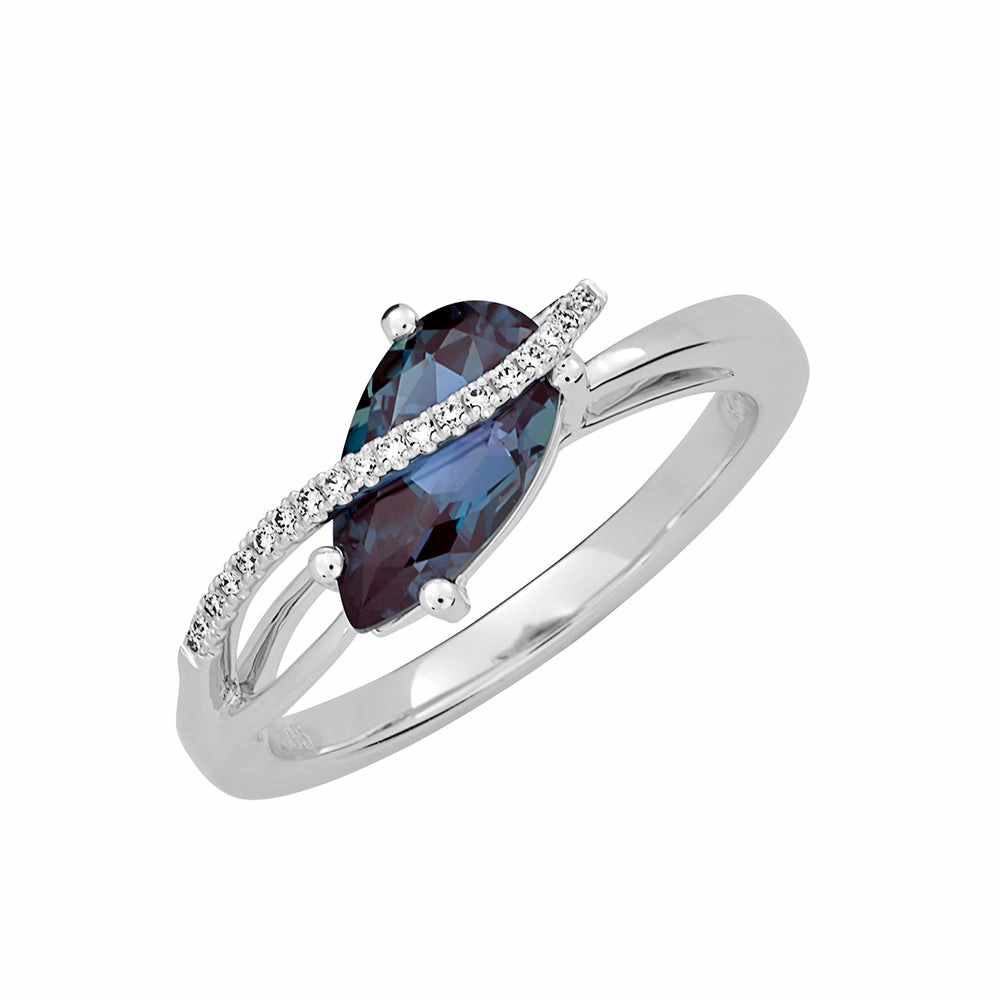 14K white gold ring featuring a 10x5.5mm pear-cut Chatham lab grown alexandrite with Chatham lab grown diamond accents. Zoom Focus