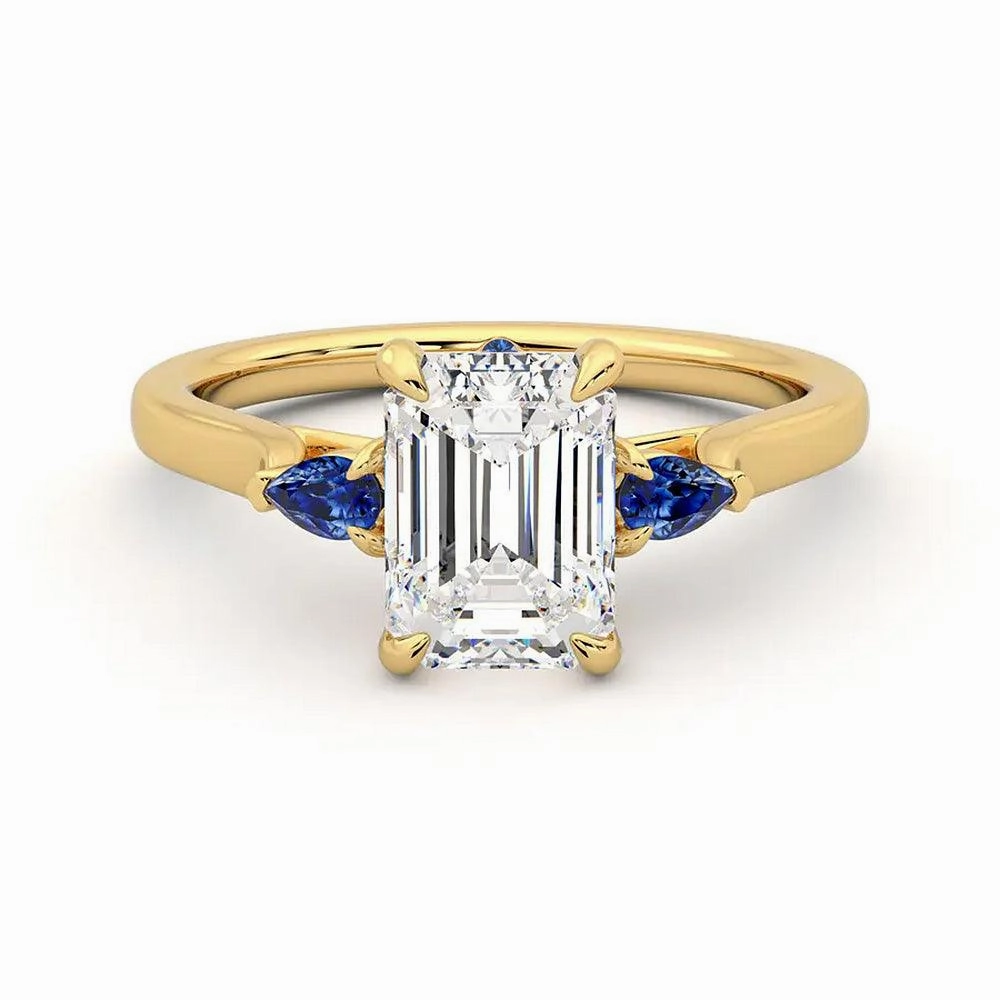 Romantic Edge Luxury Line Three Stone Emerald Cut Moissanite Engagement Ring with Hidden Anniversary Stone Accent