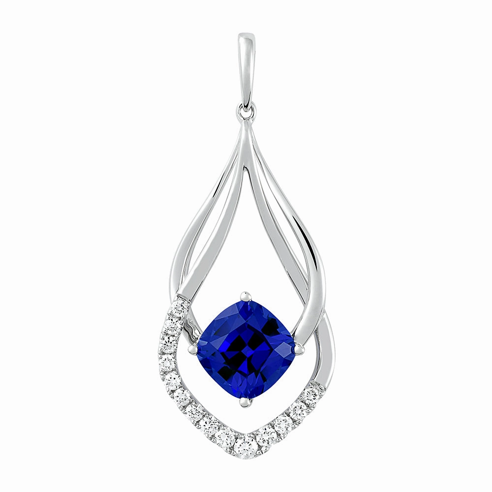 14K white gold pendant featuring a century-cut Chatham lab grown sapphire with Chatham lab grown diamond accents. Glowing Details