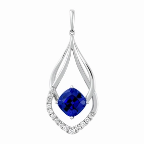 14K white gold pendant featuring a century-cut Chatham lab grown sapphire with Chatham lab grown diamond accents. Glowing Details