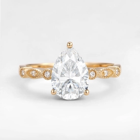 Unique Inspired Pear Shaped Moissanite Engagement Ring Finishing Accent Seasonal Light