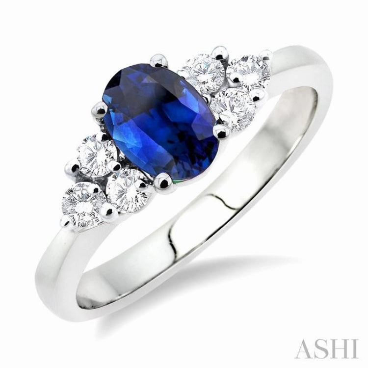 Wonderful Object 7x5mm Oval Cut Sapphire and 1/3 Ctw Round Cut Diamond Ring in 14K White Gold